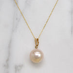 Pearl Solitaire Pendant with Soft Pink Glow