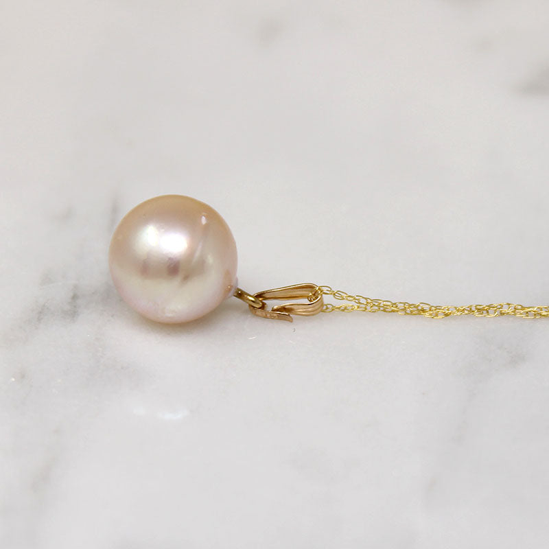 Pearl Solitaire Pendant with Soft Pink Glow