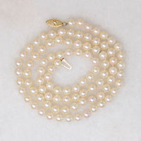 31" Strand of Glossy Cultured Pearls with Gold Clasp
