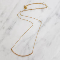 Tiny Diamonds in Graceful Rose Gold Arc Necklace