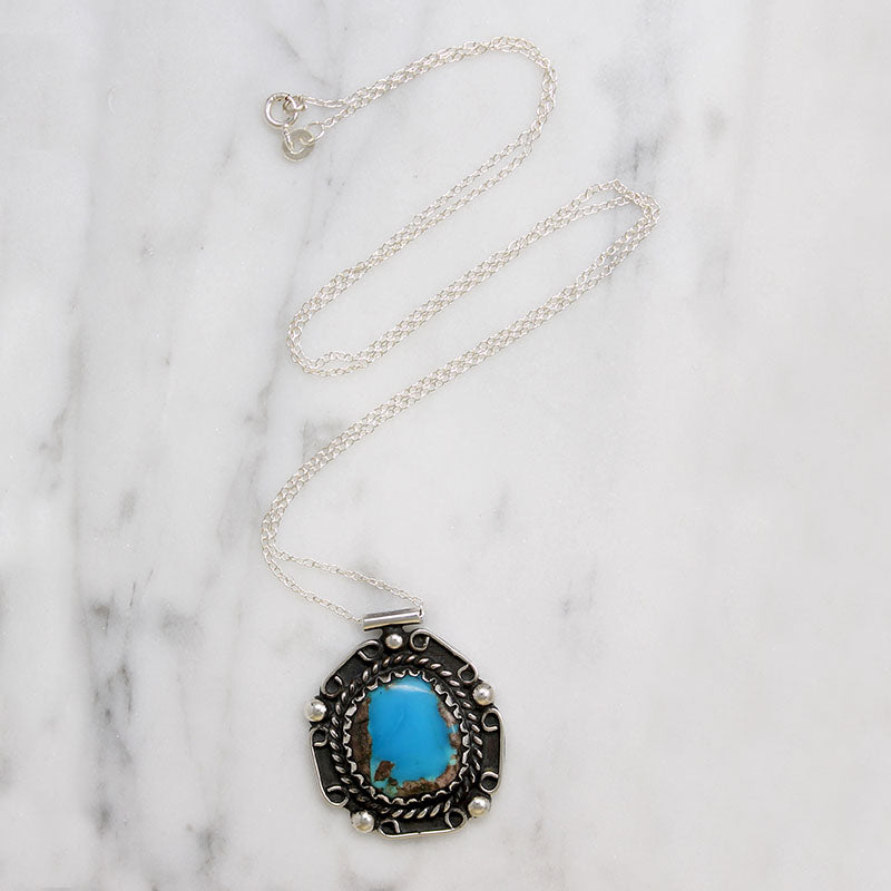 Stunning Turquoise in Ornate Mexican Sterling Pendant