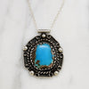 Stunning Turquoise in Ornate Mexican Sterling Pendant