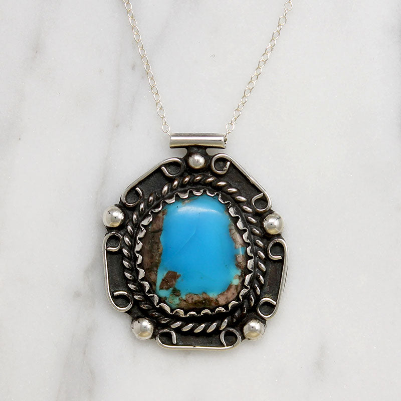 Stunning Turquoise in Ornate Mexican Sterling Pendant