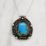 Stunning Turquoise in Ornate Mexican Sterling Pendant