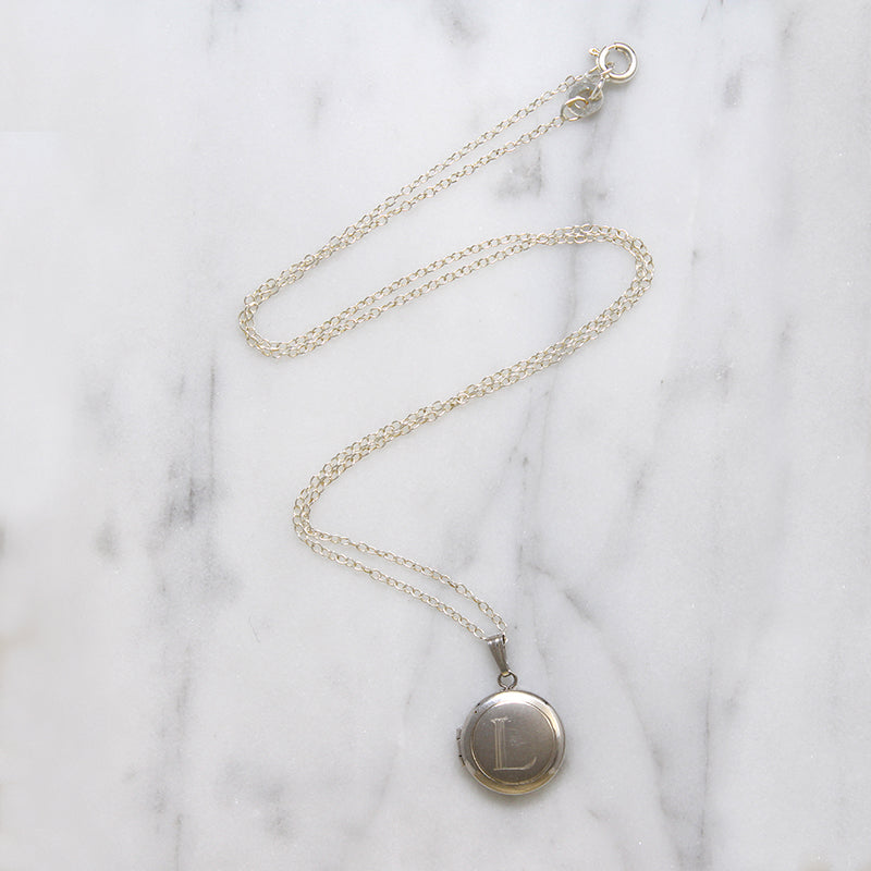 Capital "L" Tiny Round Silver Locket