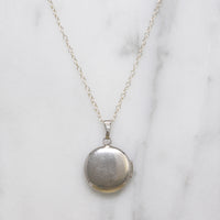 Capital "L" Tiny Round Silver Locket