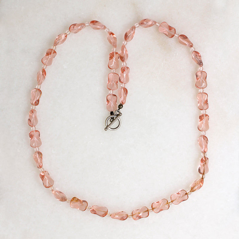 Pink Glass Beads with a Twist