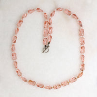 Pink Glass Beads with a Twist