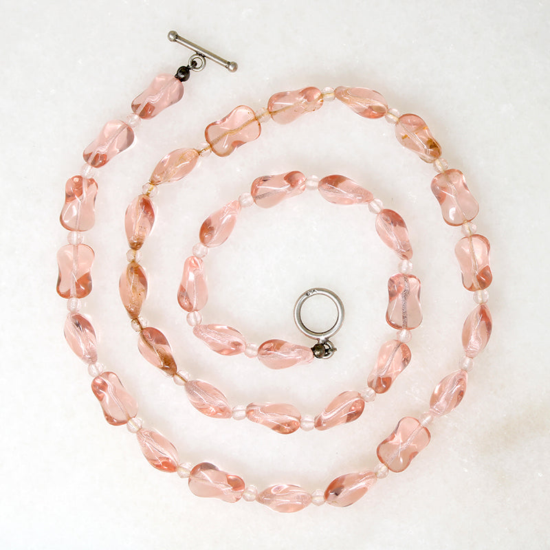 Pink Glass Beads with a Twist