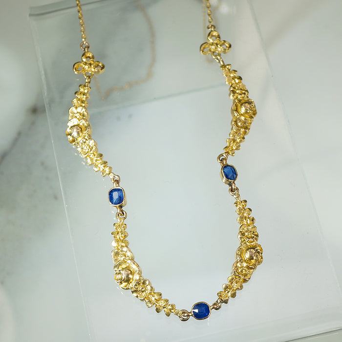 Lovely Floral Gold and Sapphire Necklace