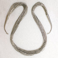 Fifty Strand Liquid Silver Bead Necklace