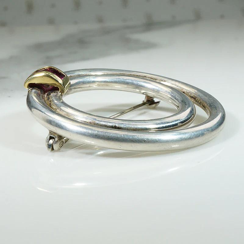 Luxurious Silver Circle Brooch with 18k & Ruby by Tiffany & Co.