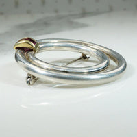 Luxurious Silver Circle Brooch with 18k & Ruby by Tiffany & Co.