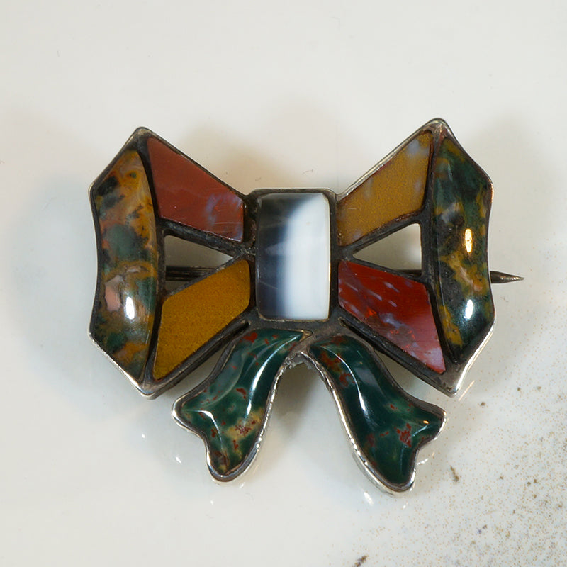 Sassy Little Parti-Colored Scottish Pebble Bow Brooch