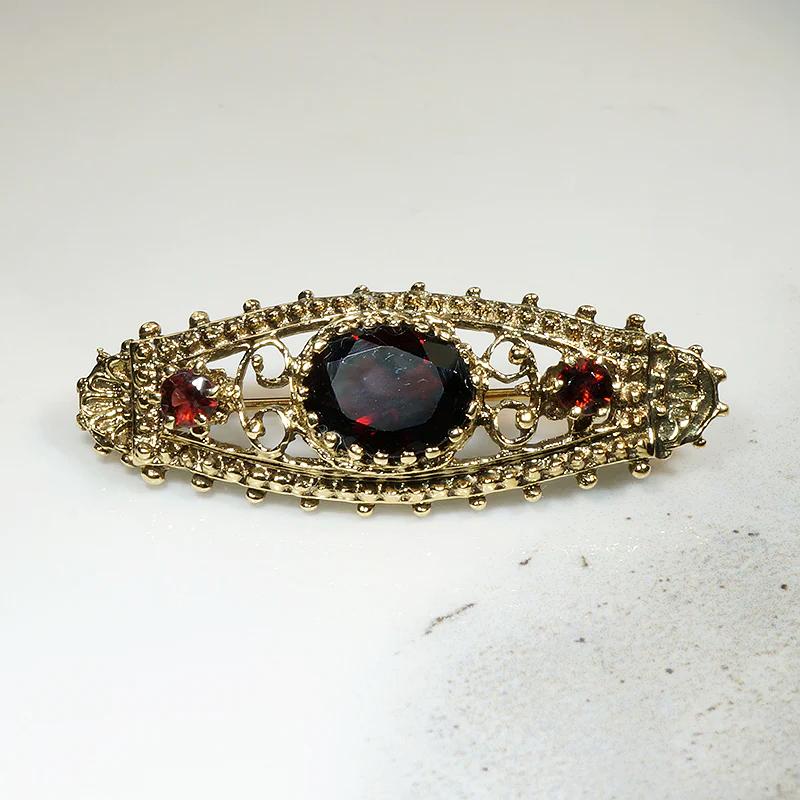 Ornate Victorian Revival Garnet & Gold Brooch