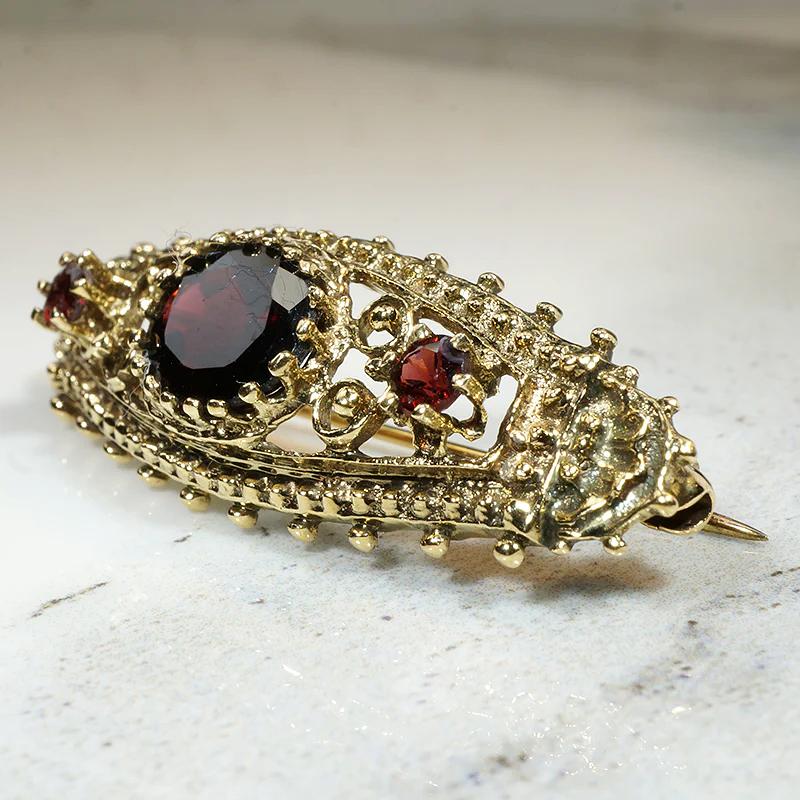 Ornate Victorian Revival Garnet & Gold Brooch