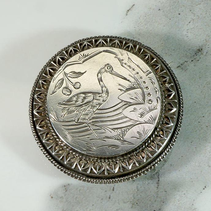 Grand Period Sterling Locket Brooch with Engraved Crane