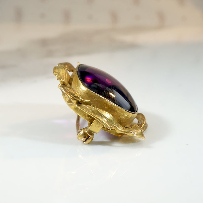 Opulent Buff Top Cut Amethyst in Foliate Gold Brooch