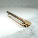 Elegant Gold Quartz Bar Pin