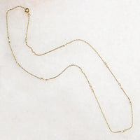 Tiny Pearl Stations Necklace by brunet