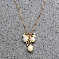 Frothy Pearl Cluster on Gold Necklace by brunet