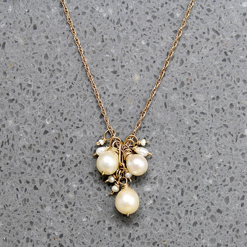 Frothy Pearl Cluster on Gold Necklace by brunet