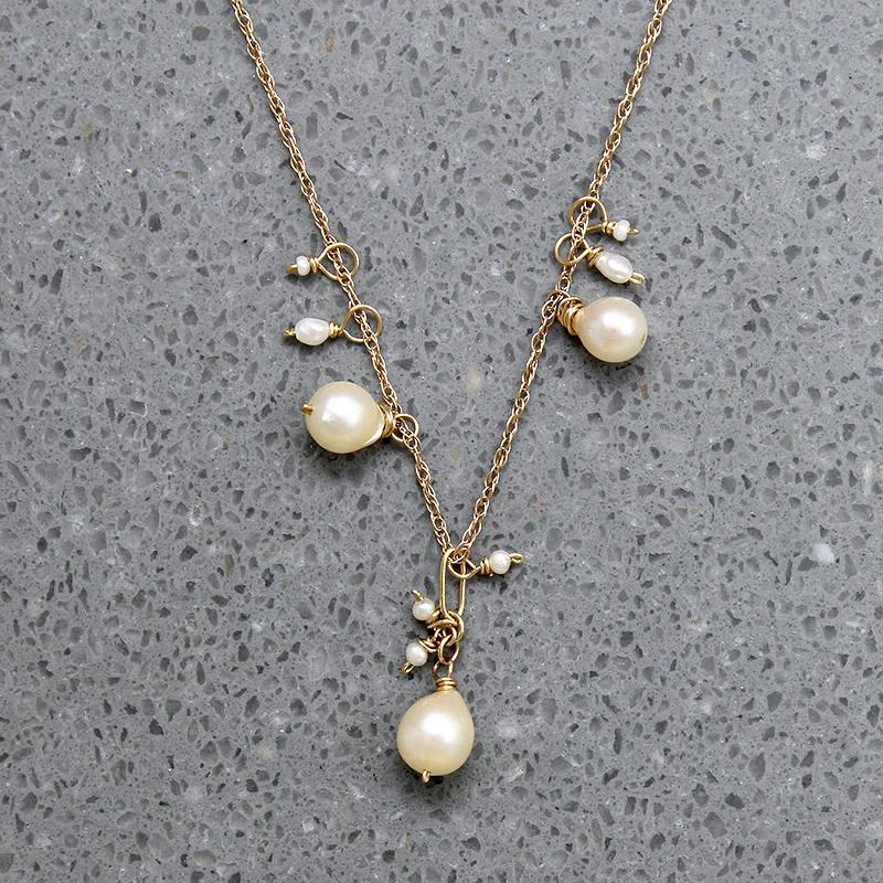 Frothy Pearl Cluster on Gold Necklace by brunet