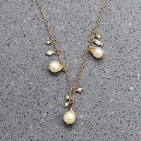 Frothy Pearl Cluster on Gold Necklace by brunet