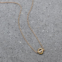 Dainty White Pearls in Gold "O" Necklace by brunet