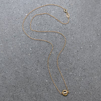 Dainty White Pearls in Gold "O" Necklace by brunet