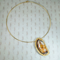 Marianne Hunter: A Woman Stands for Peace Necklace