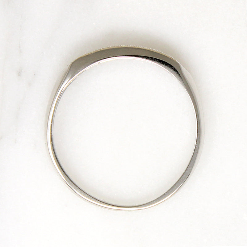 Chic Seven Diamond Platinum Wedding Band