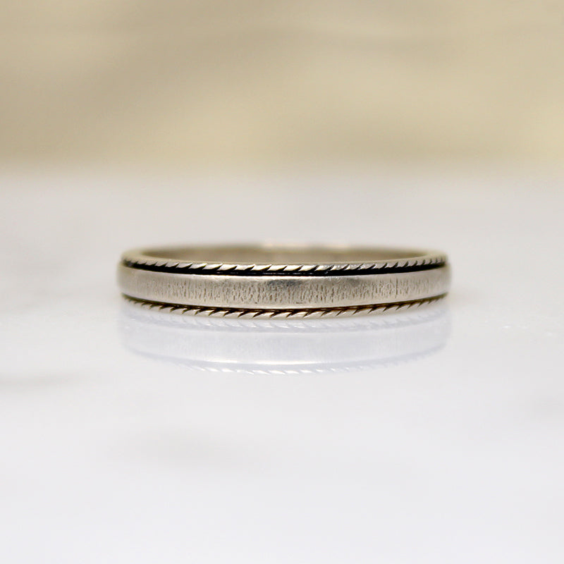 Unusual Tapered White Gold Band with a Twist