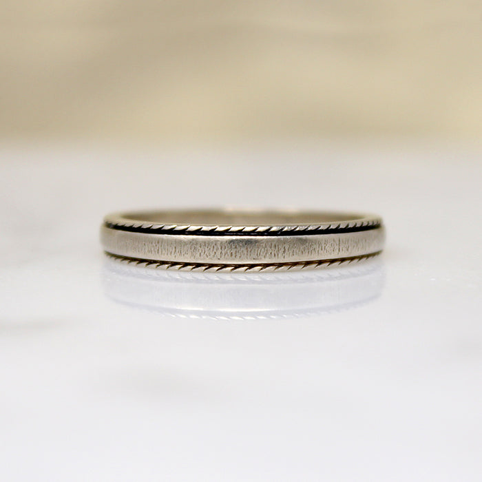 Unusual Tapered White Gold Band with a Twist