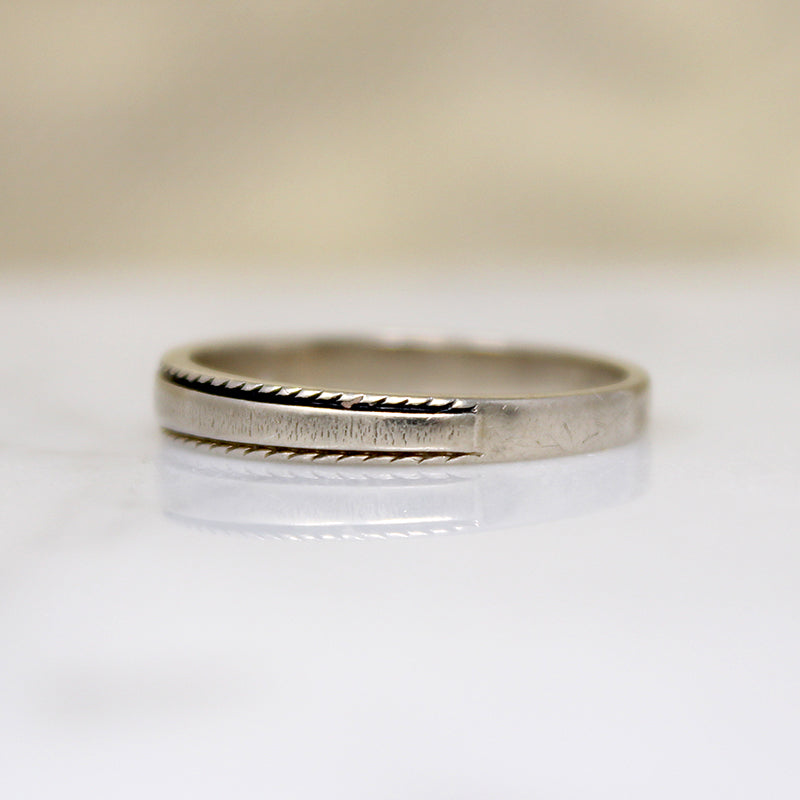 Unusual Tapered White Gold Band with a Twist