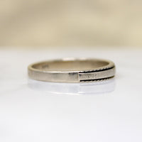 Unusual Tapered White Gold Band with a Twist