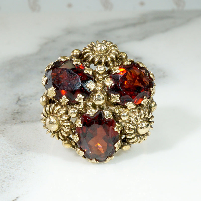 Cheerful Garnets & Daisies Cocktail Ring
