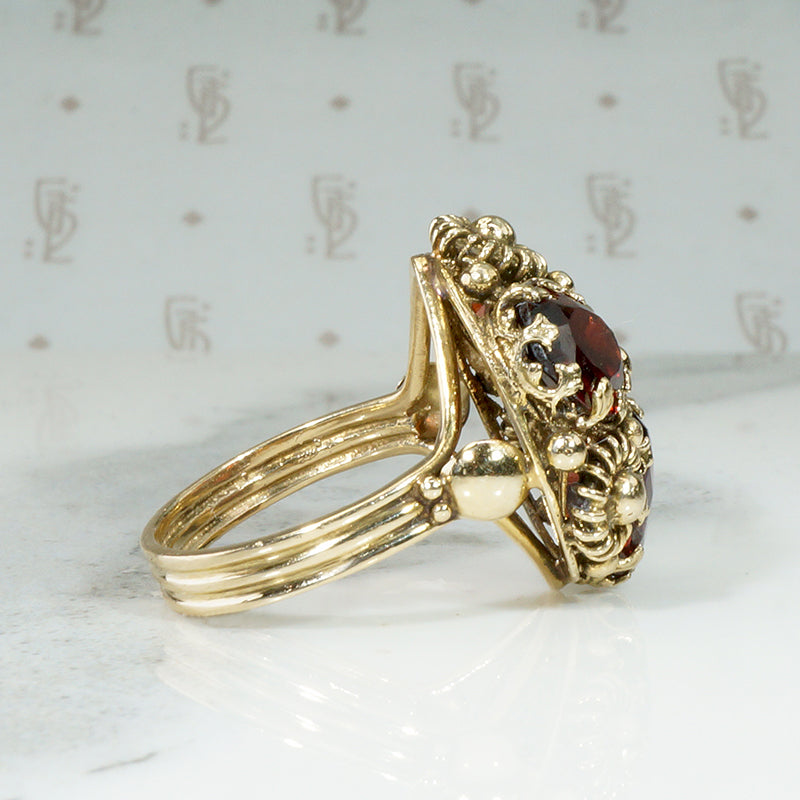 Cheerful Garnets & Daisies Cocktail Ring