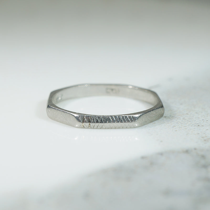 Faceted Platinum Band with Engraved Texture