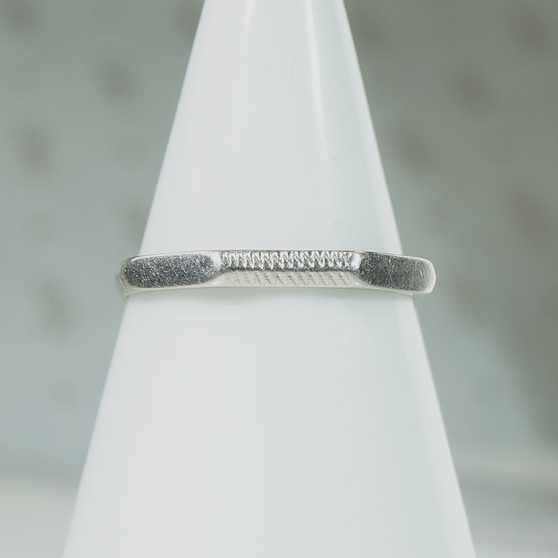 Faceted Platinum Band with Engraved Texture