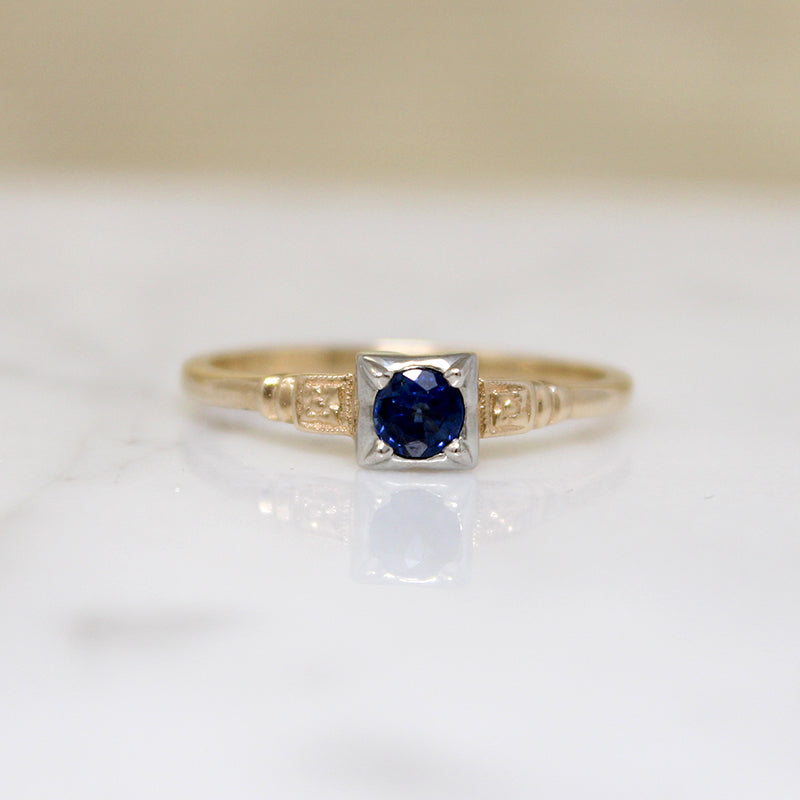 Graceful Sapphire Engagement Ring with Engraved Flowers
