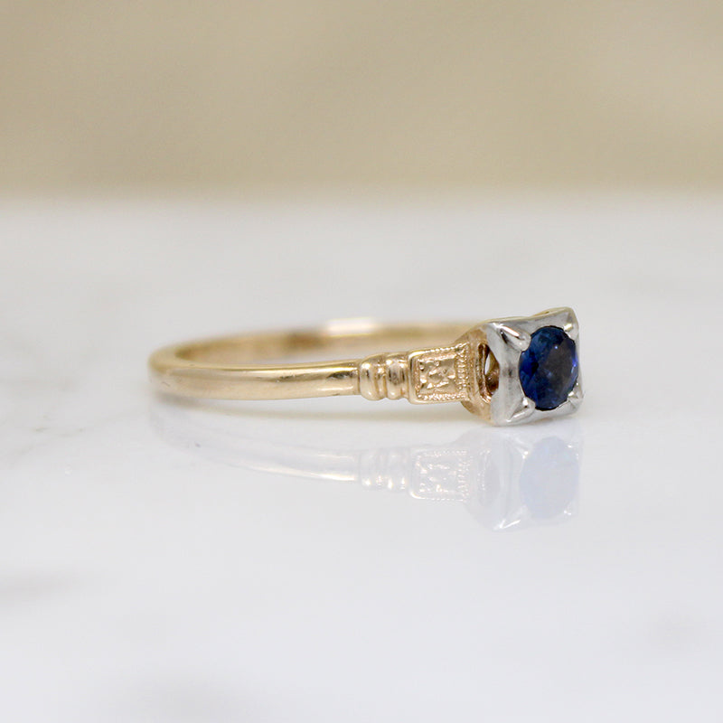 Graceful Sapphire Engagement Ring with Engraved Flowers
