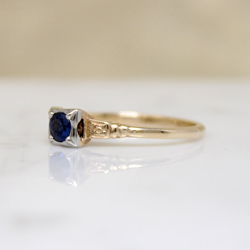 Graceful Sapphire Engagement Ring with Engraved Flowers