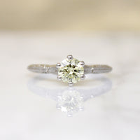 Delightful Yellow Diamond in Engraved Platinum Solitaire