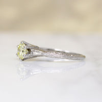 Delightful Yellow Diamond in Engraved Platinum Solitaire