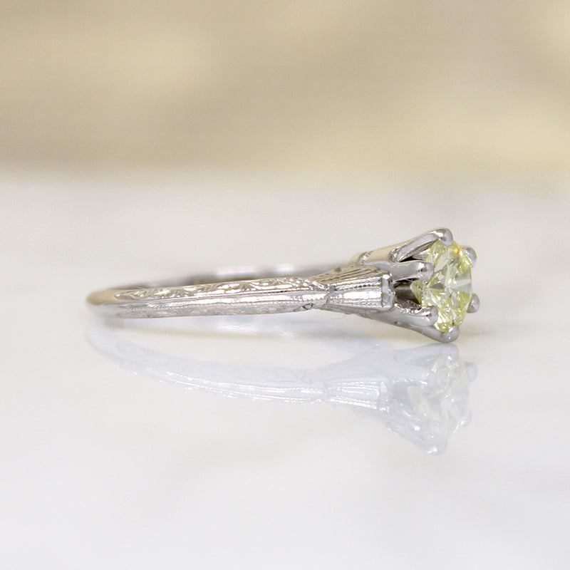 Delightful Yellow Diamond in Engraved Platinum Solitaire