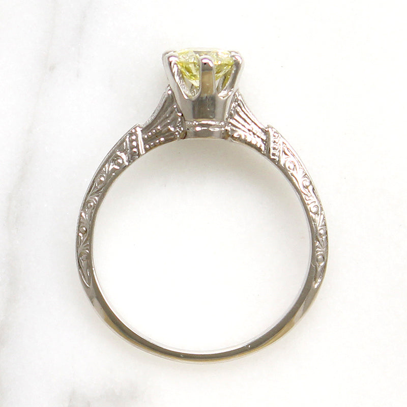 Delightful Yellow Diamond in Engraved Platinum Solitaire