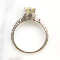 Delightful Yellow Diamond in Engraved Platinum Solitaire