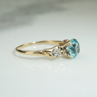 Brilliant Blue Zircon and Diamond Engagement Ring