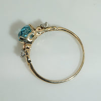 Brilliant Blue Zircon and Diamond Engagement Ring